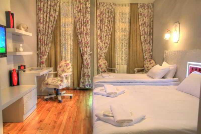 Omer Hayyam Suites Истанбул Стая снимка